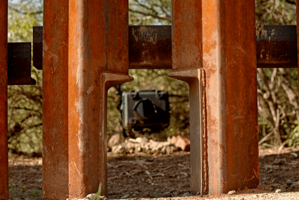 A camera trap to record animals is situated at the front of a small wildlife opening in the San Bernardino National Wildlife Refuge