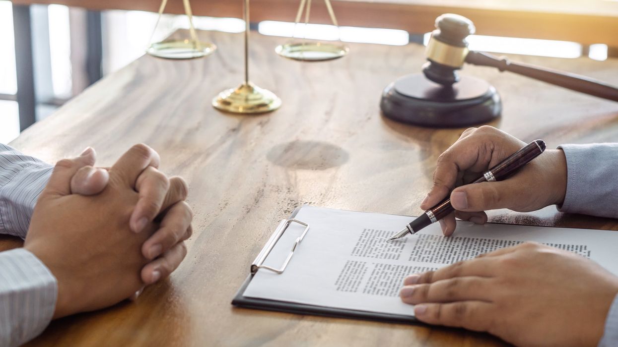 A close up of a lawyer meeting with a client.