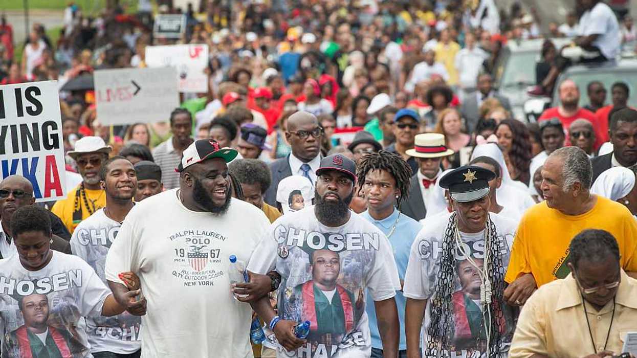 A crowd marching in Missouri, in honor of Michael Brown Jr.