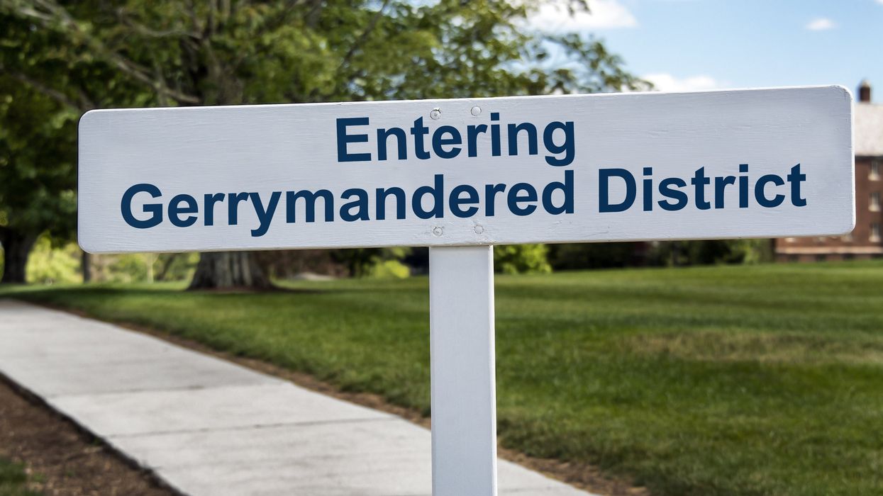 A fictional, fanciful sign depicts the results of voter suppression through the unfair, partisan manipulation of district lines (gerrymandering).