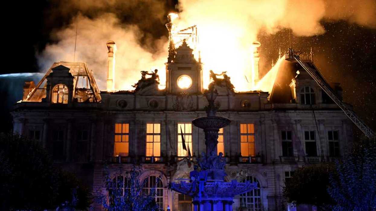 A fire burns and destroys the city hall in Limoges, central France.