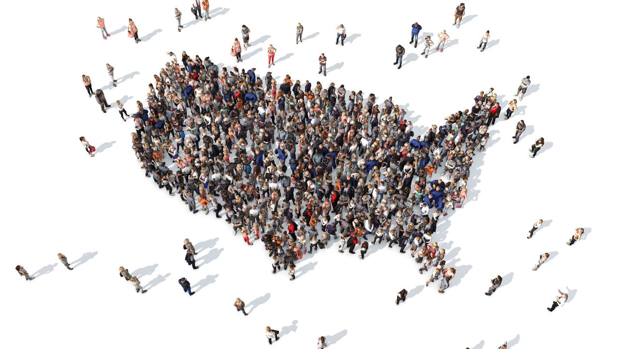 a group of people arranged in the shape of the United states of America map