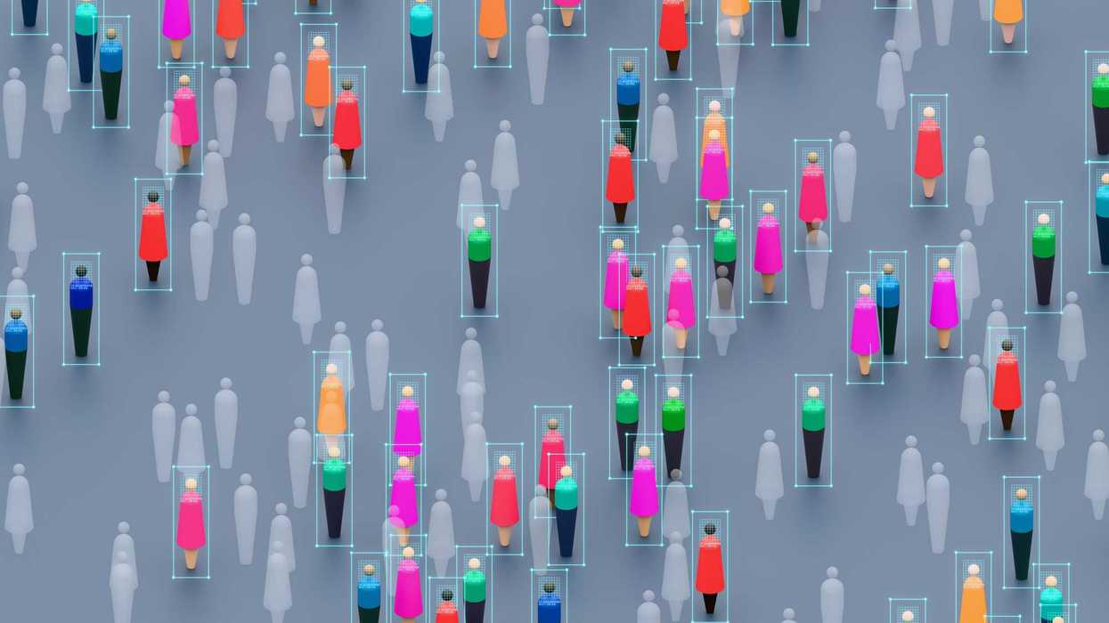 A large group of people is depicted while invisible systems actively scan and analyze individuals within the crowd