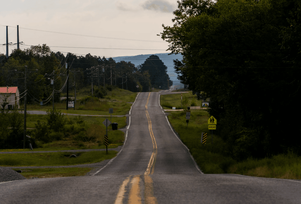 A road runs through rural Pushmataha County, Oklahoma