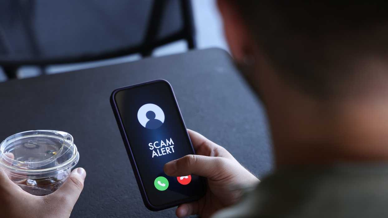 a scam alert on a phone