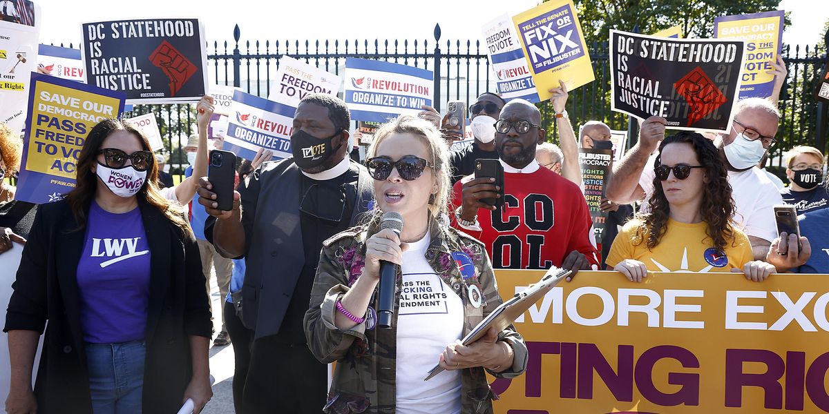 Actress Alyssa Milano and other voting rights advocate at a rally