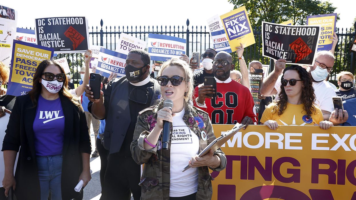 Actress Alyssa Milano and other voting rights advocate at a rally