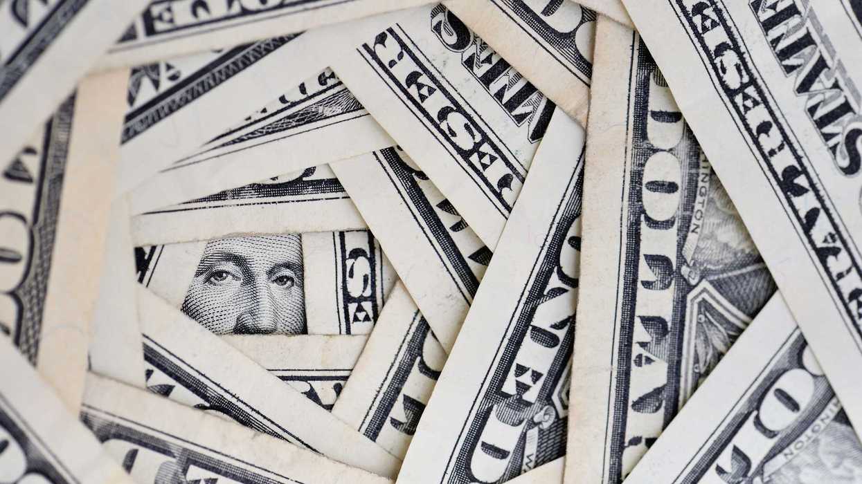 American dollars positioned around each other.