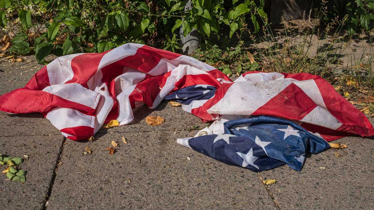 American flag on sidewalk