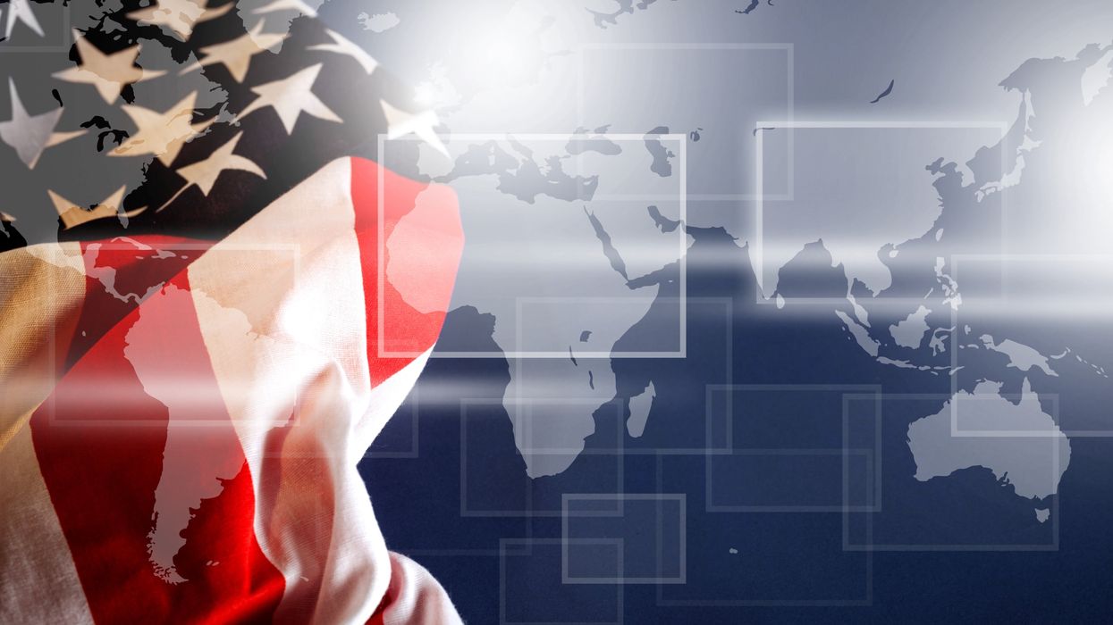 American flag over a world map background
