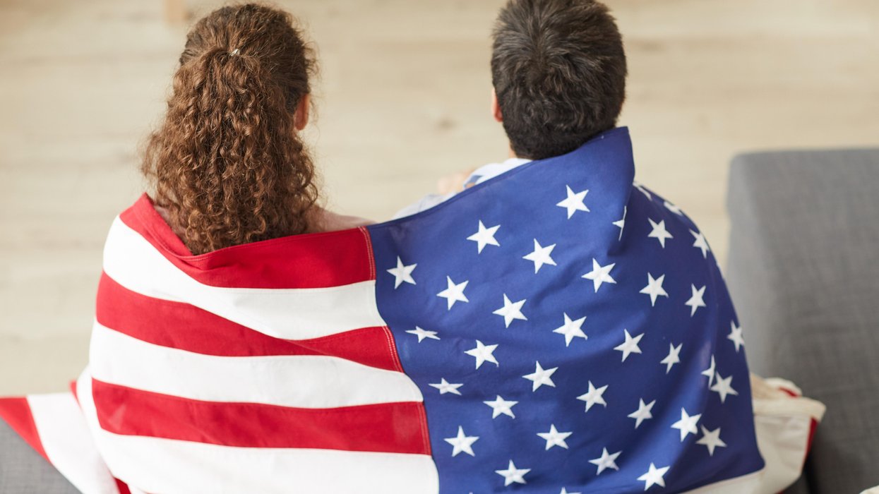 Americans wrapped in a flag