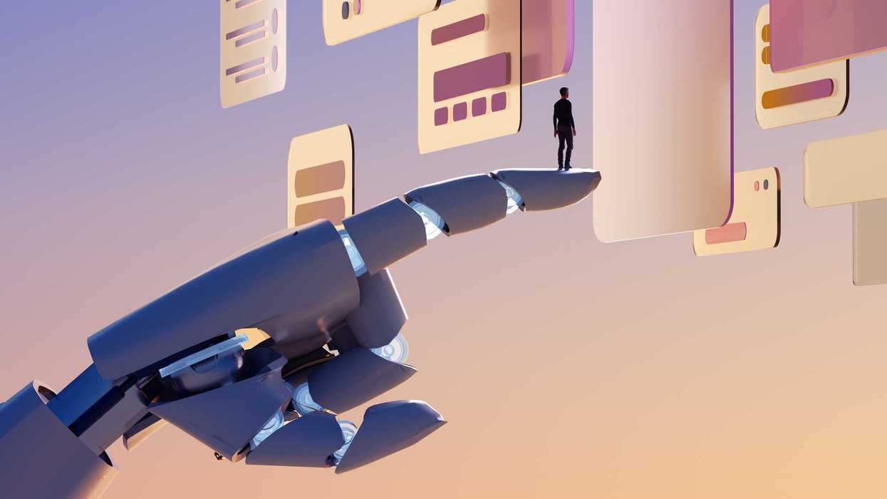 An illustration of a person standing on a giant robotic hand.