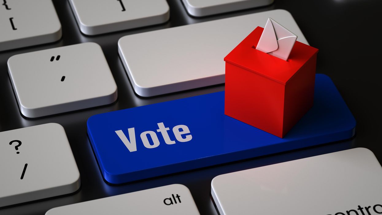 Ballot box on a keyboard, with a key labeled "vote"