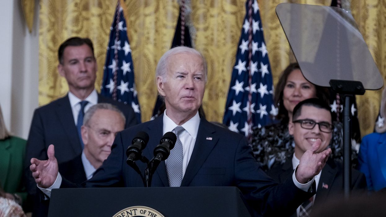 Biden speaing at a podium