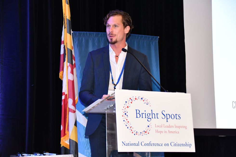 Brandon Whitney of ioby accepts the national winner award