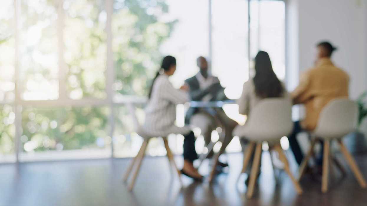Business meeting, blurred background and people in office for teamwork, collaboration and planning