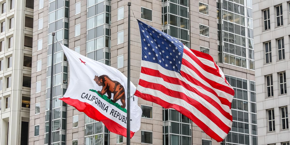 California and U.S. flags flying side by side