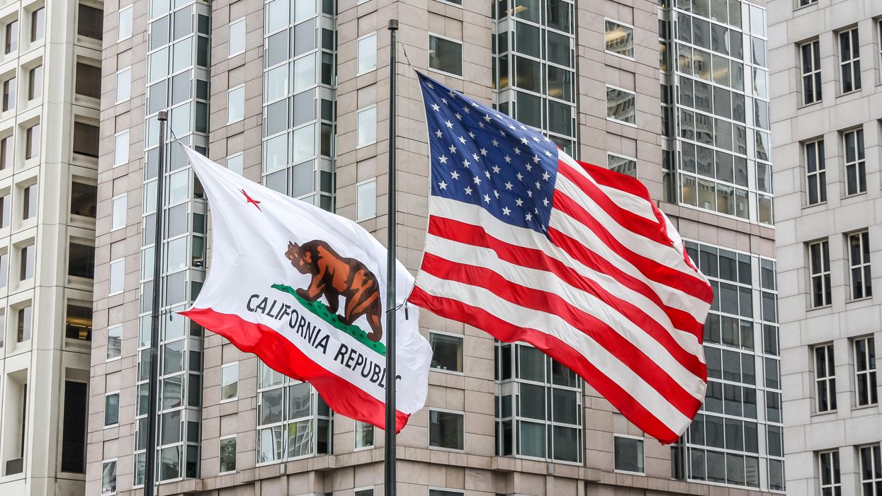 California and U.S. flags flying side by side