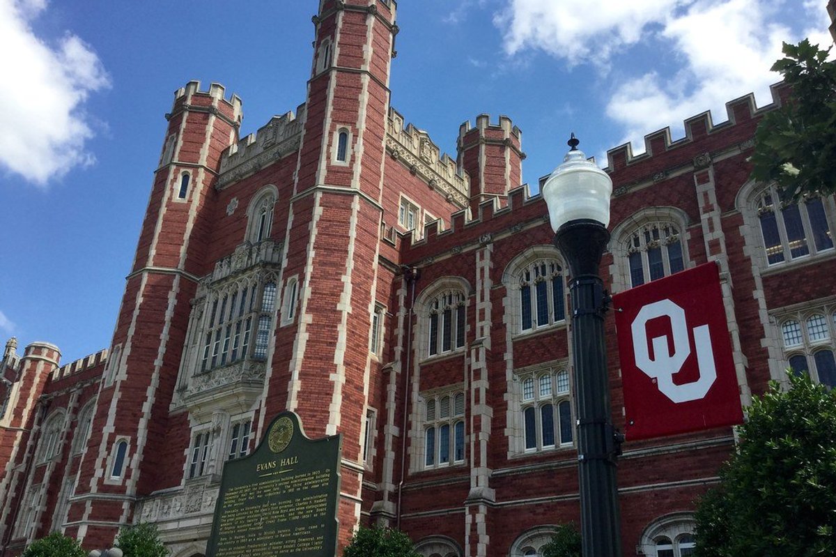 Campus building with university flag