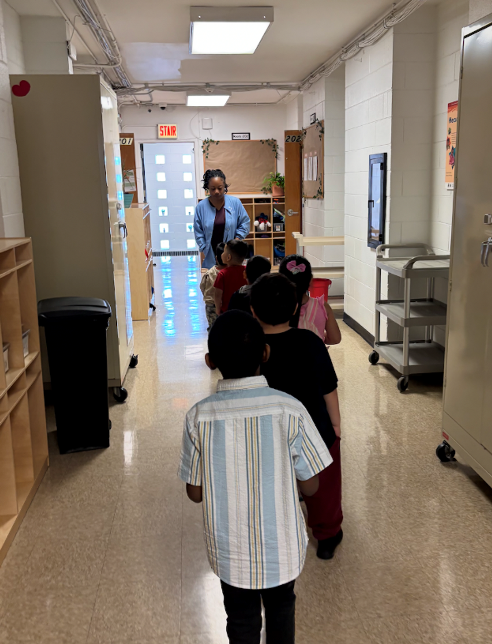 Carole Robertson children line up to go play outside