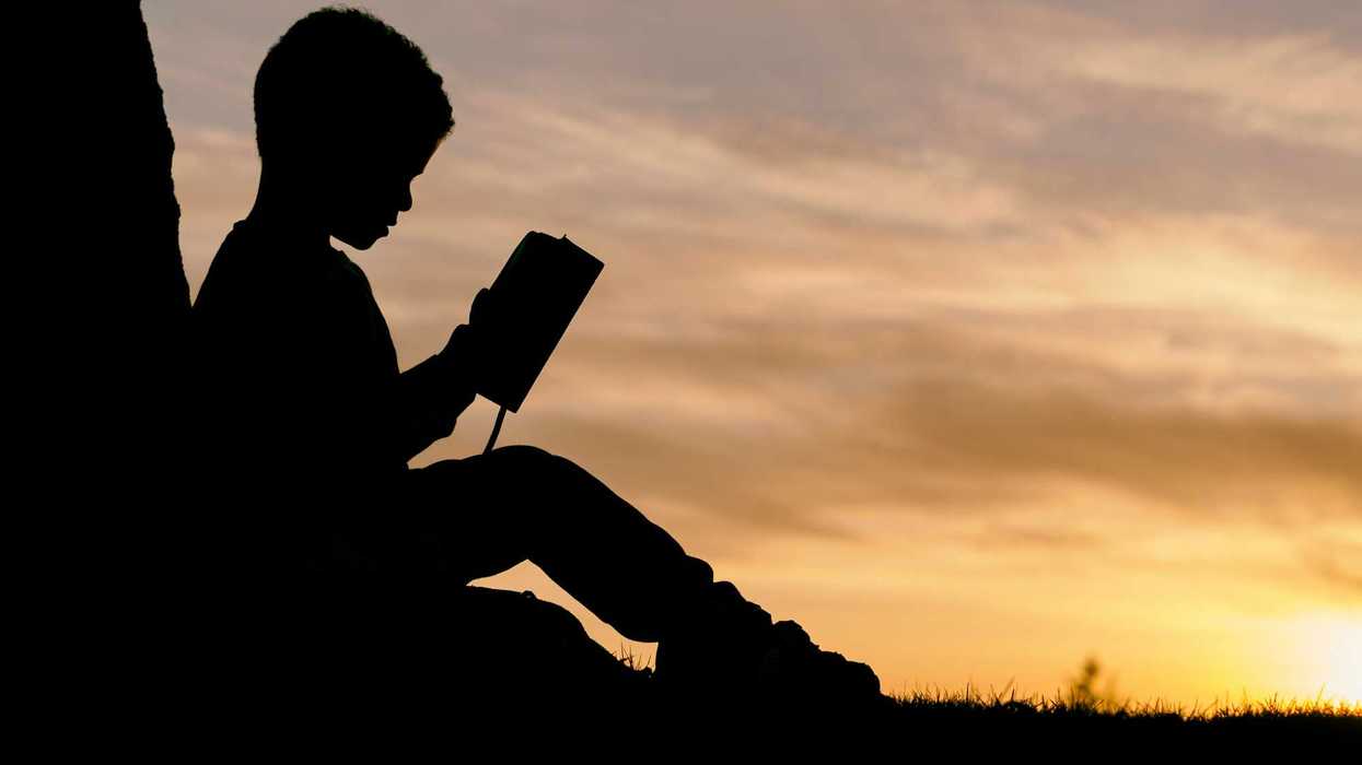 child reading a book
