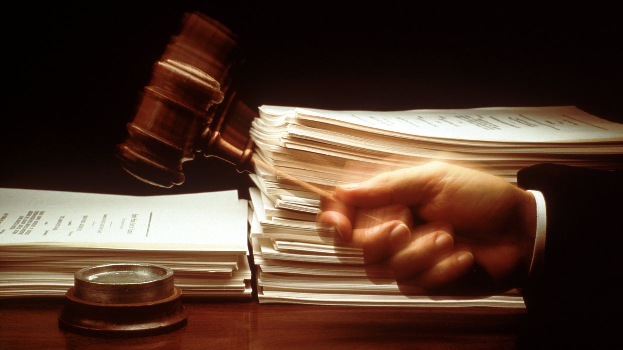 Close up of a judge hammering a gavel