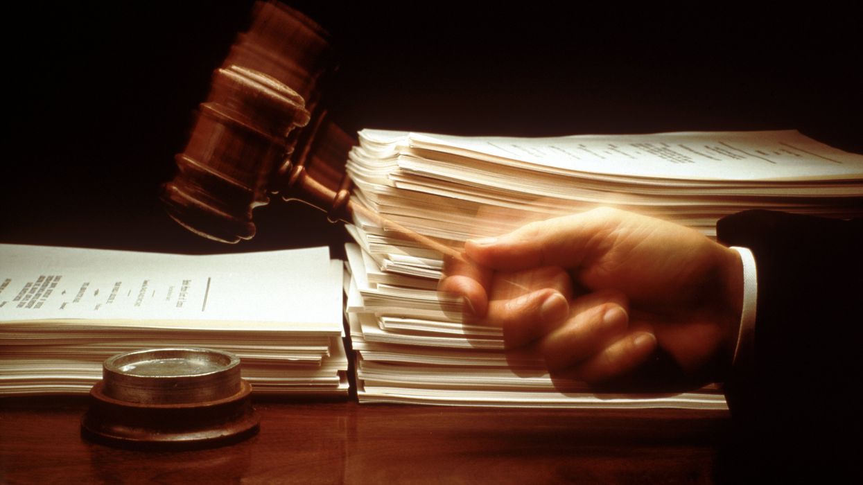 Close up of a judge hammering a gavel