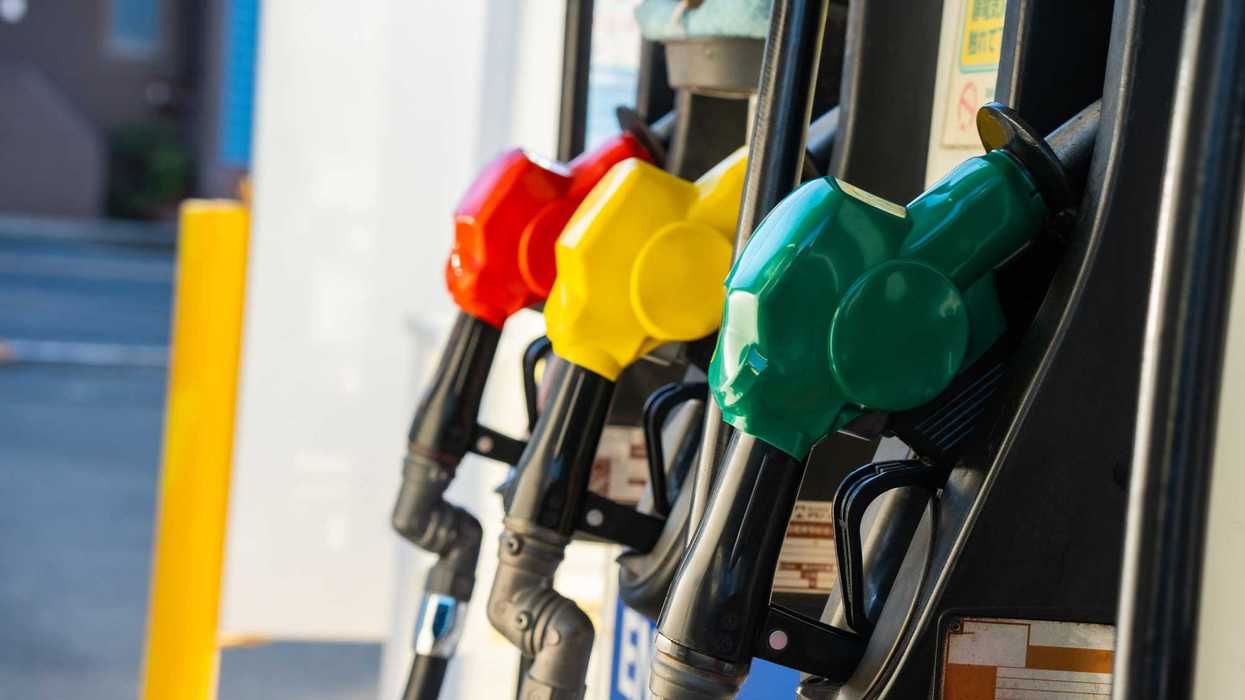 Close-up of the petrol station's gasoline pumps and fuel nozzles.