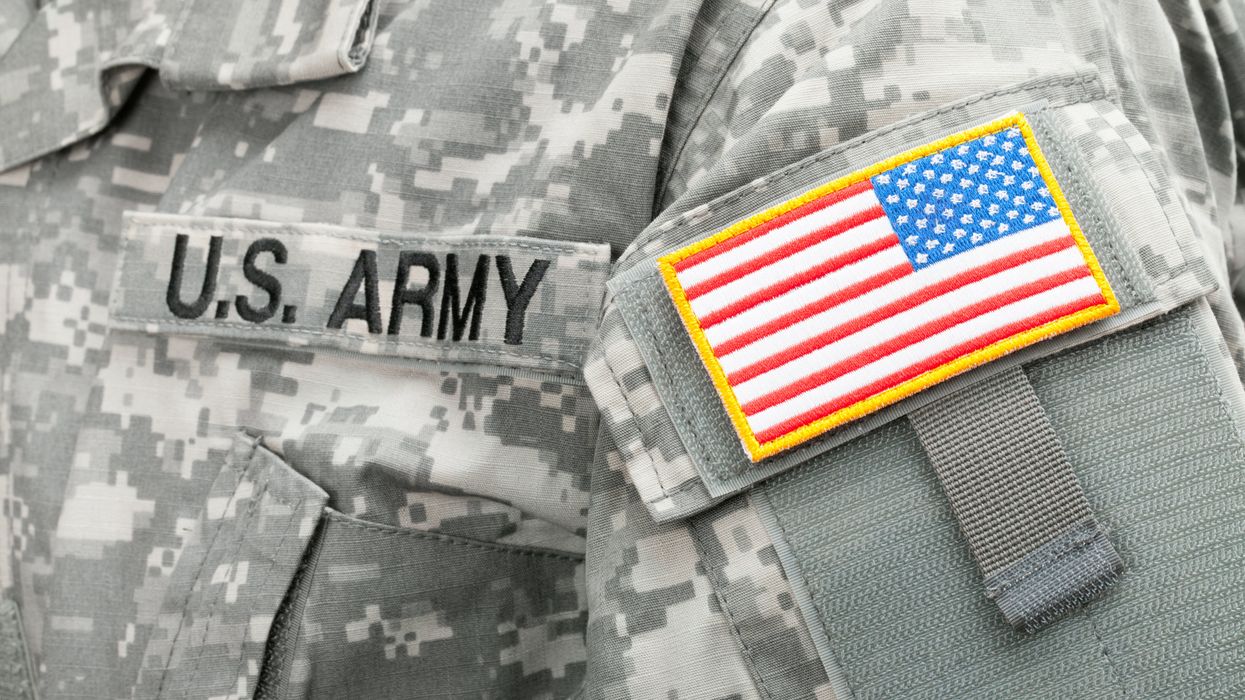 Close up of U.S. Army and American flag patches on a uniform