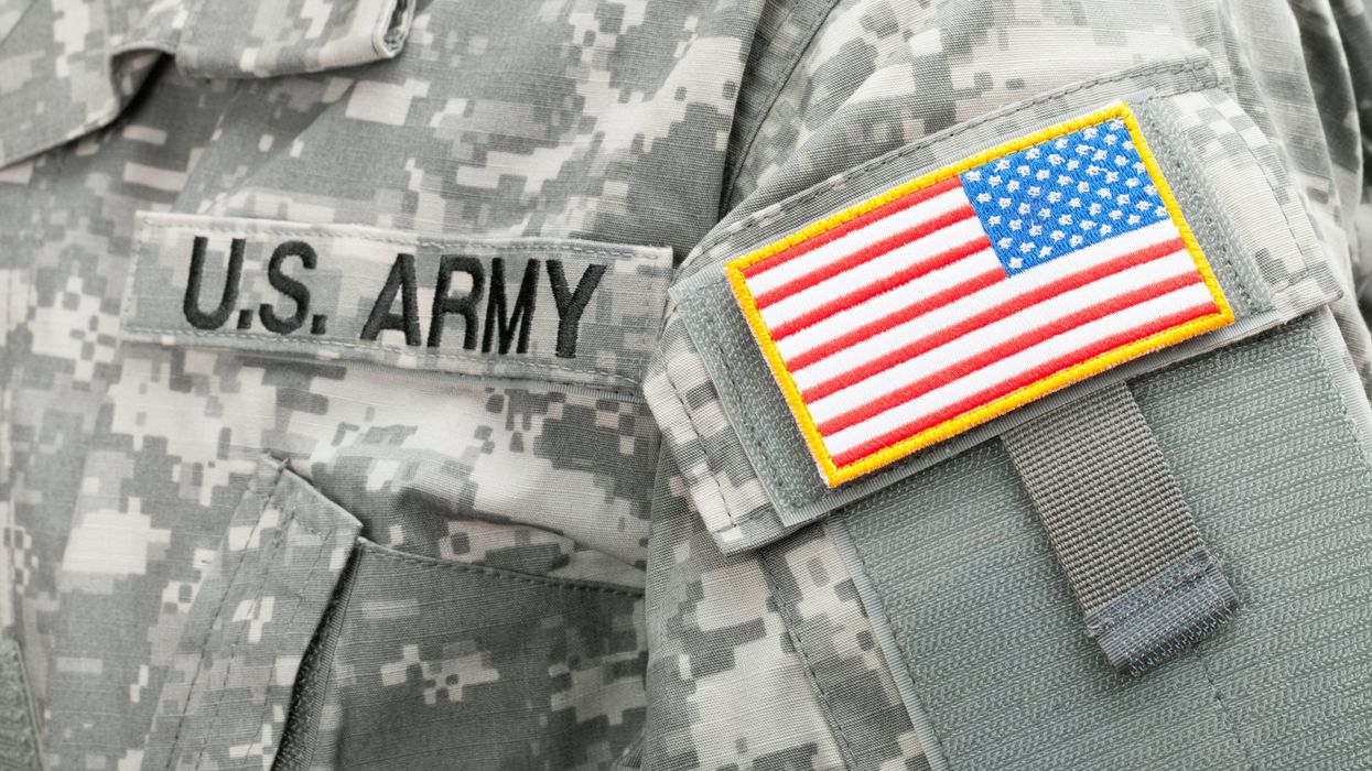 Close up of U.S. Army and American flag patches on a uniform