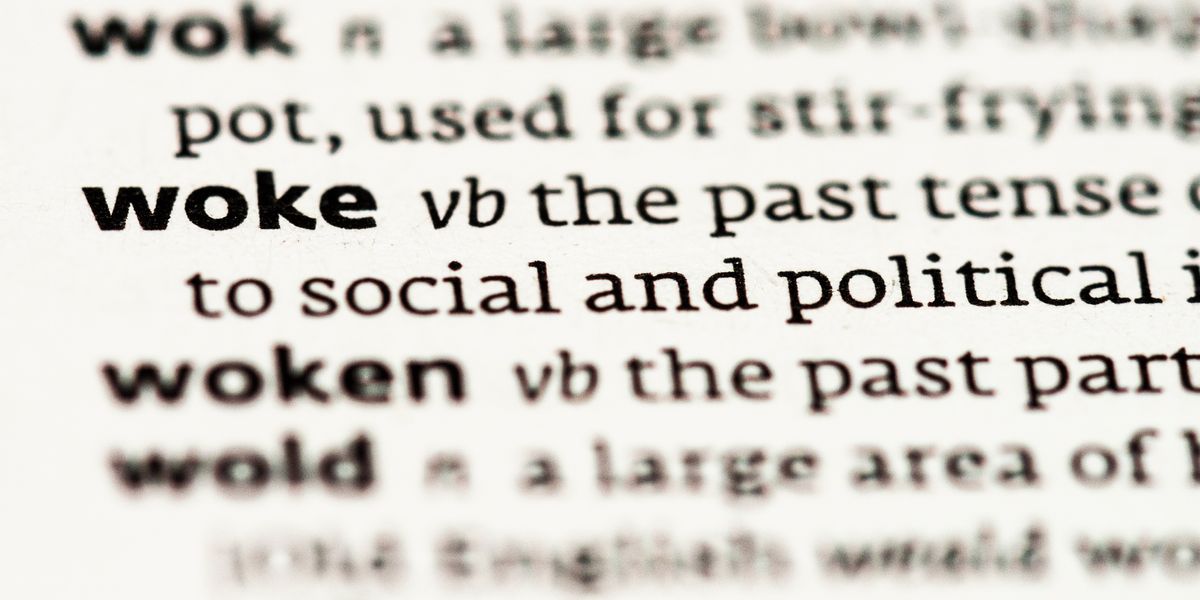Close-up of "woke" entry in dictionary