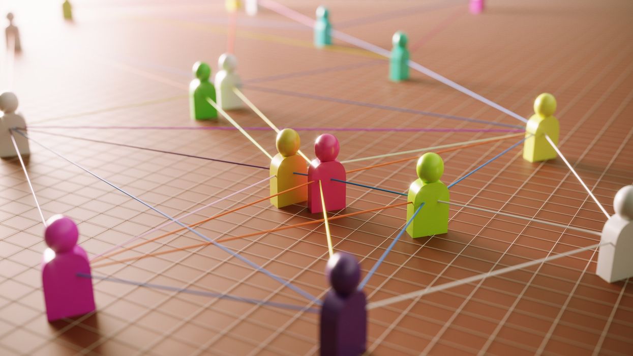 Communication concept with multi colored abstract people icons.