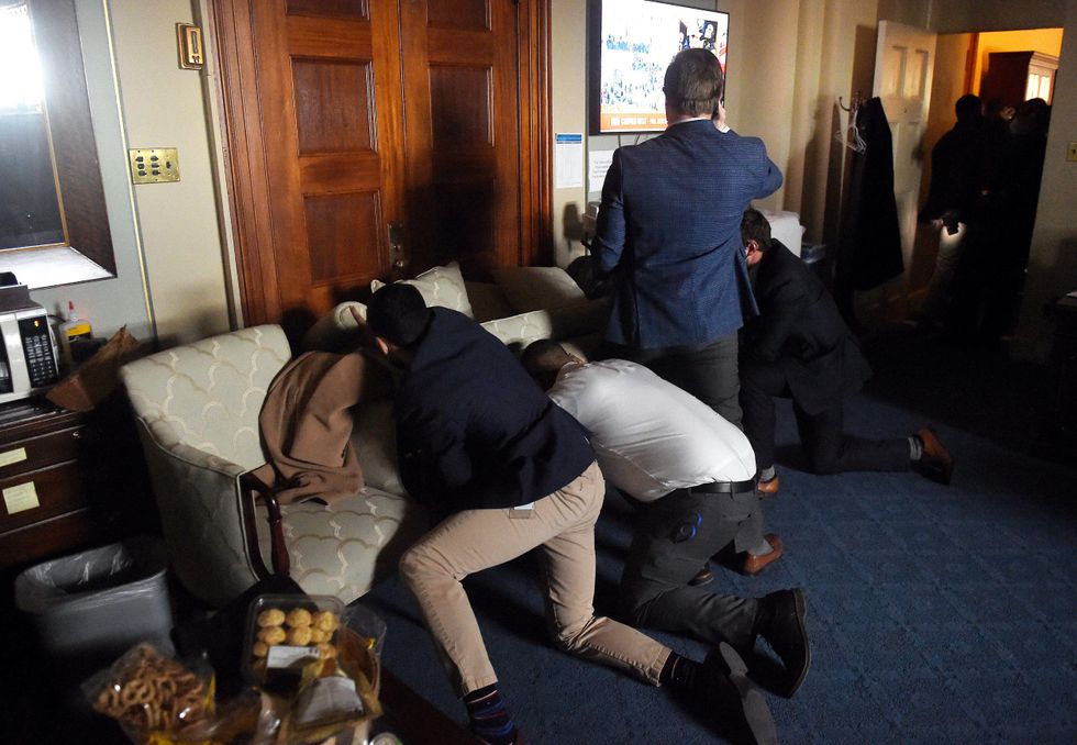 Congressional staffers build barricade