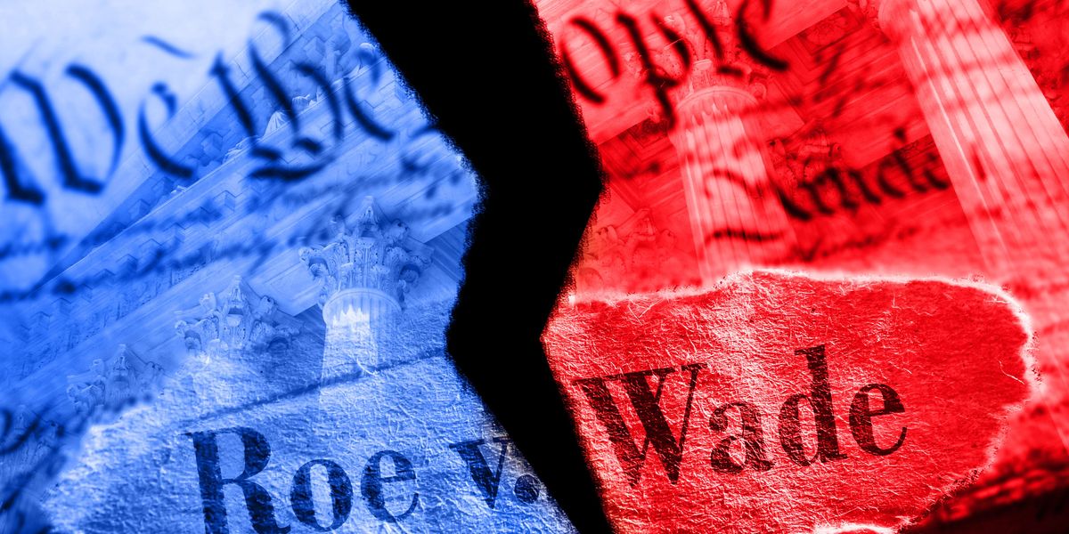 Constitution and Roe v. Wade headline torn into red and blue halves