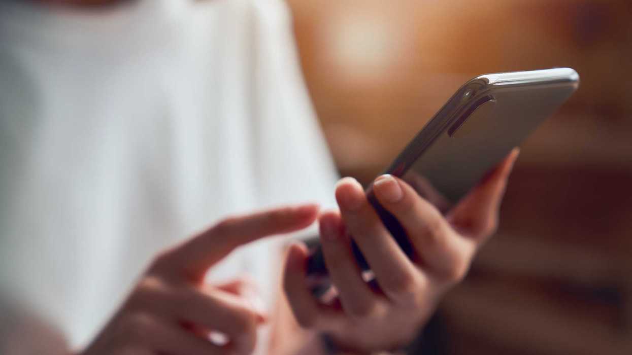 Creative Images Creative Images & Video Images Creative Editorial Video Creative Editorial Search by image or video Close-up of woman holding a smartphone.