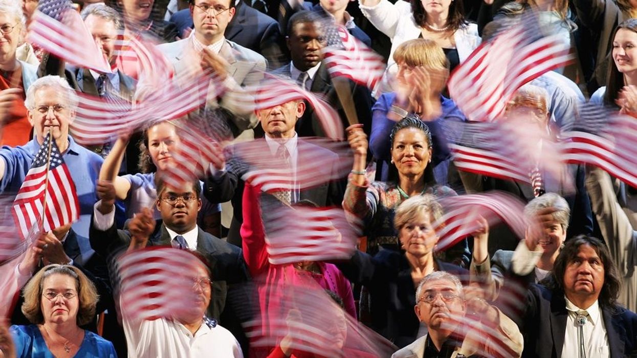 Crowd waving flags