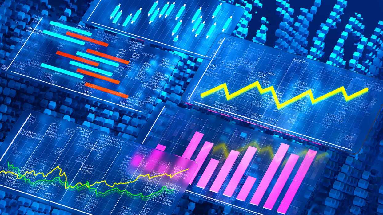 Digital generated image of multiple white cubes with abstract economy graphs and charts.