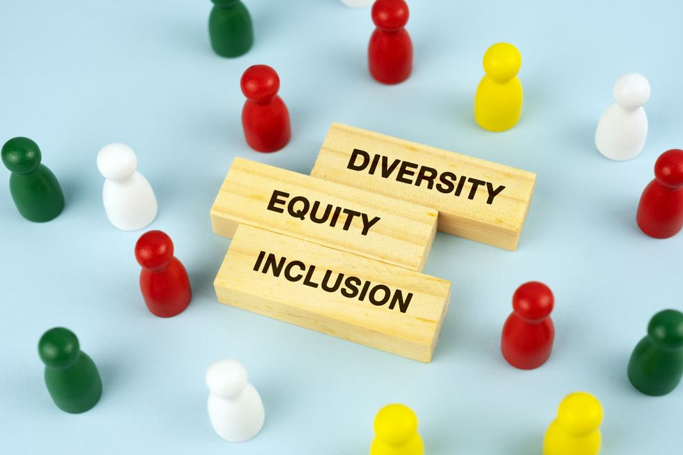 "Diversity," "Equity" and "Inclusion" on wood blocks