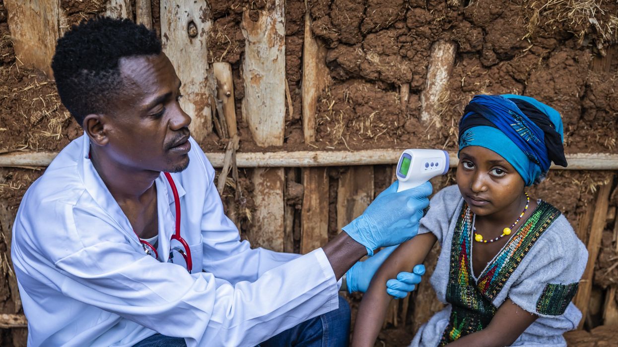 Doctor treating a patient