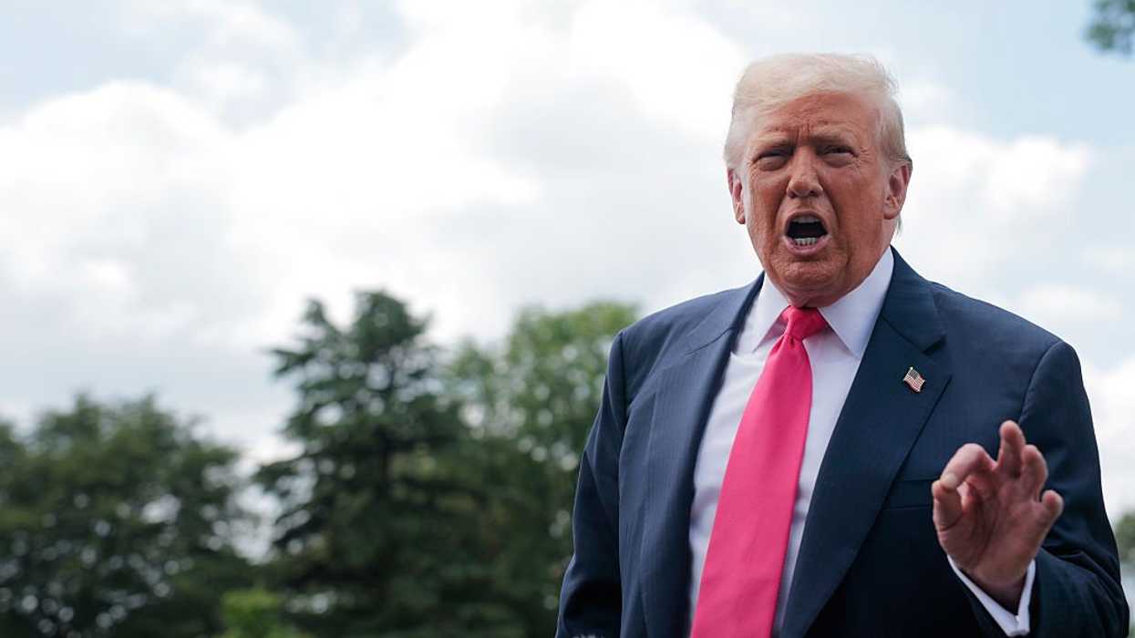 donald trump speaks to the media as he departs washington, dc