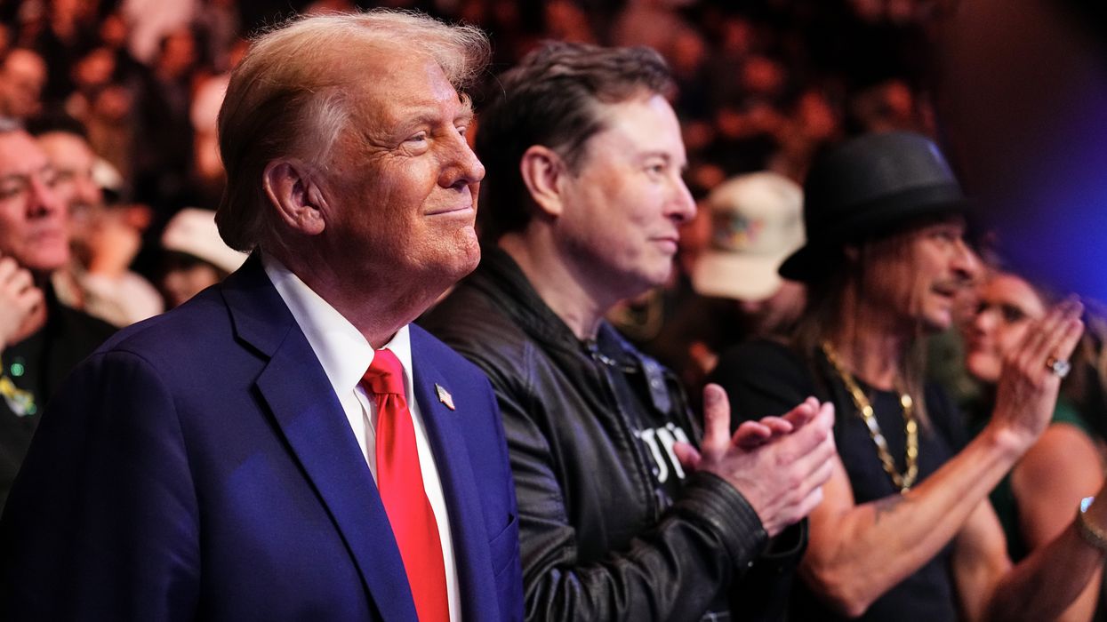 Donald Trump standing with Elon Musk and Kid rock
