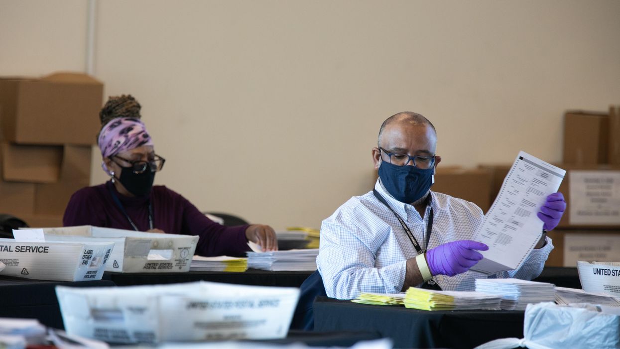 Election workers counting ballots