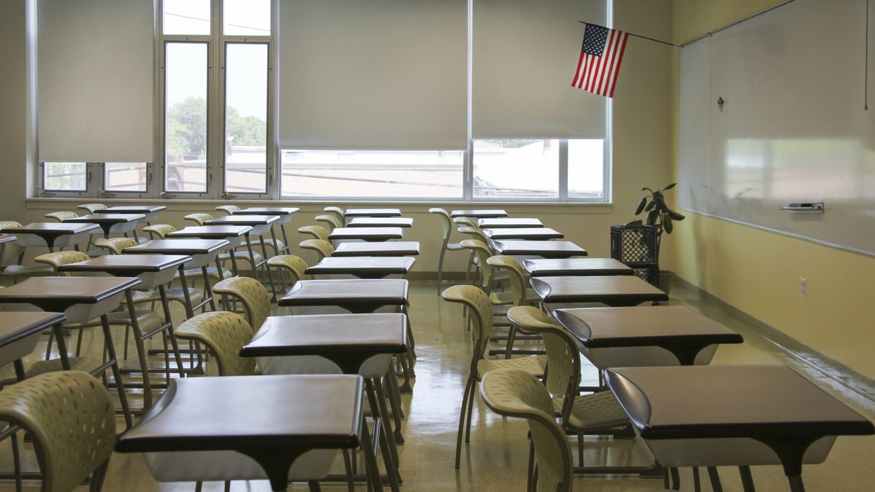 Empty classroom with U.S. flag