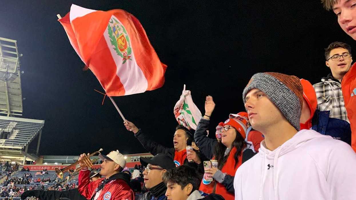 fans cheer the fire