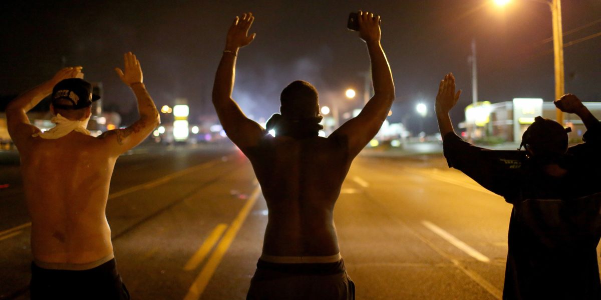 Ferguson protest, "hands up, don't shoot"