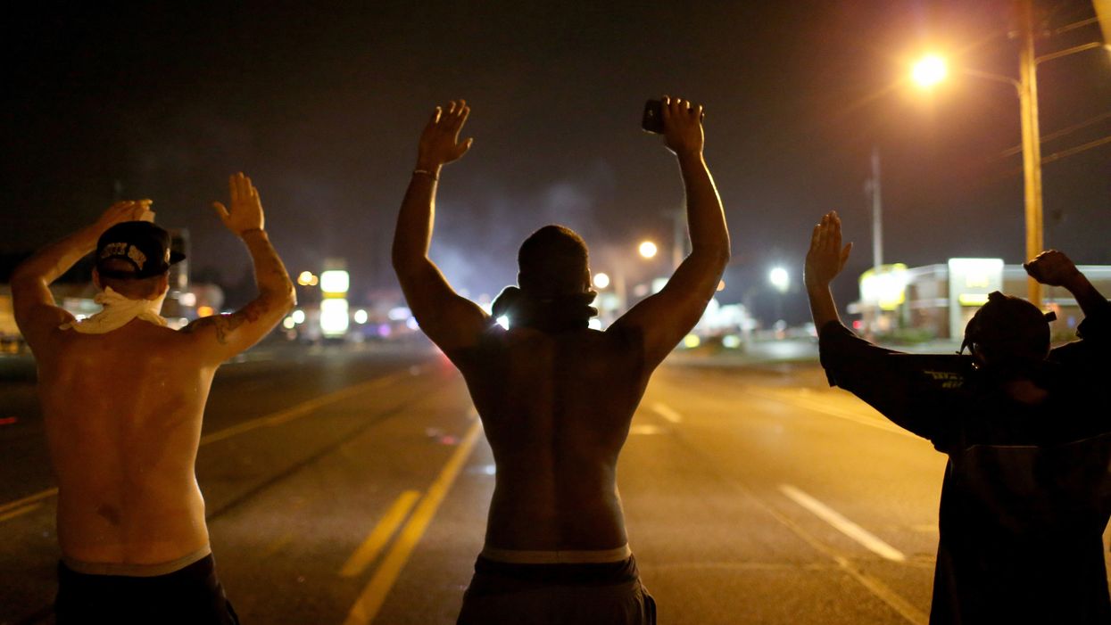 Ferguson protest, "hands up, don't shoot"