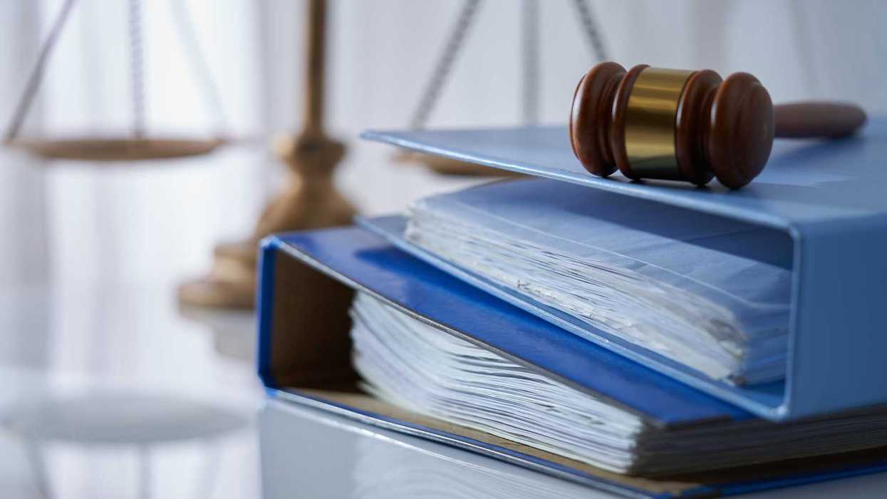 Gavel on top of binders