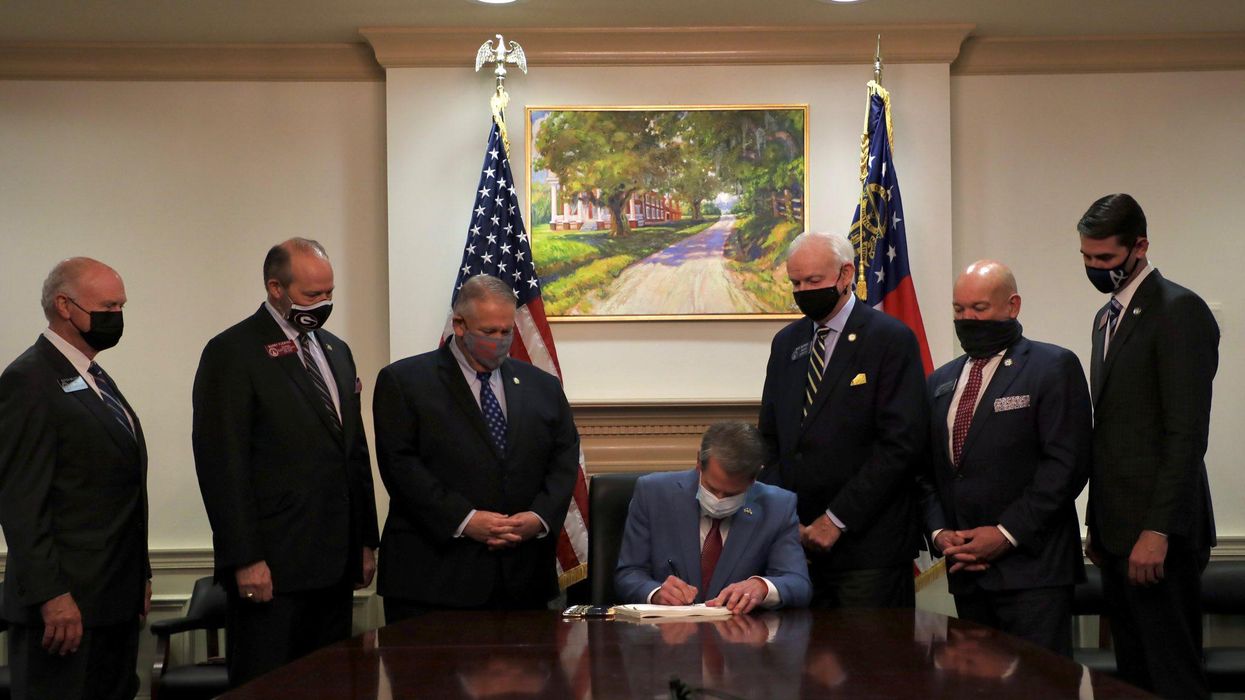 Georgia Gov. Brian Kemp signs voting bill