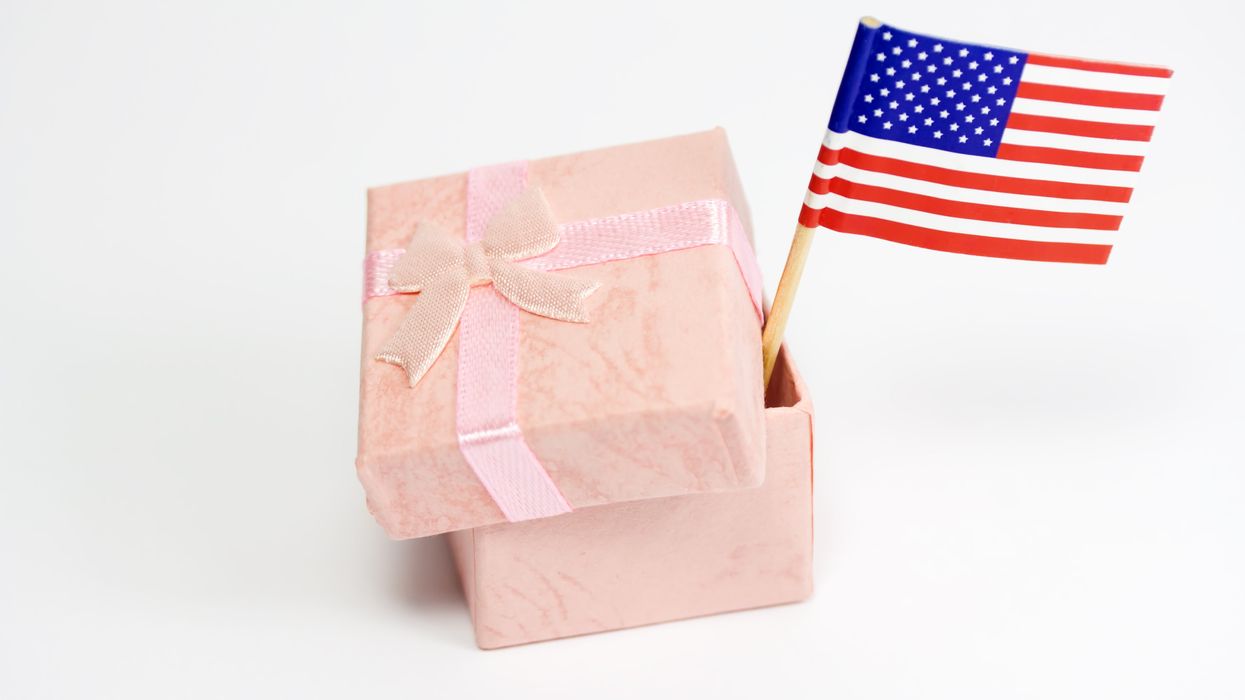 Gift box with an American flag sticking out
