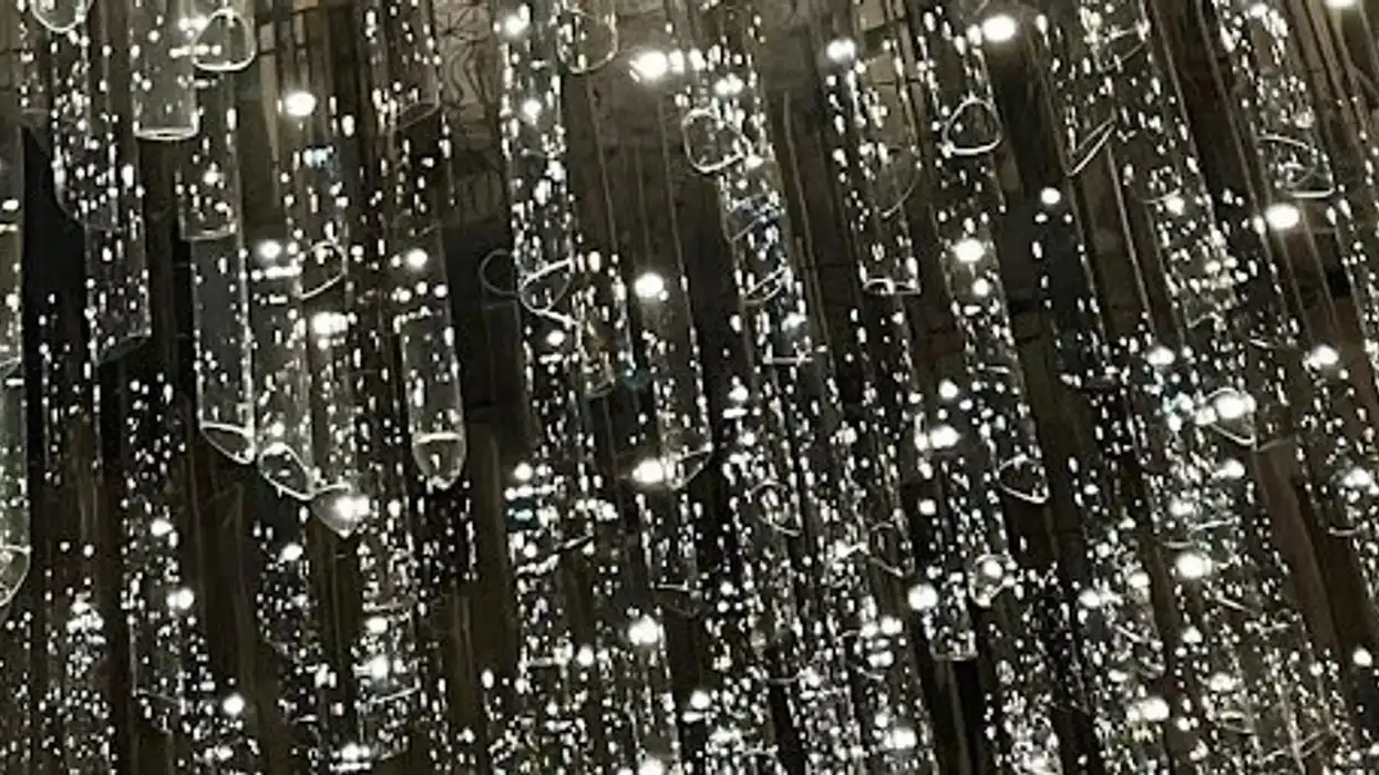 Glass chandelier lit up from the inside